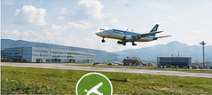 Aircraft taking off above the runway surroundings