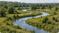 After: the river has regained its meanders, lined with meadows and copses.